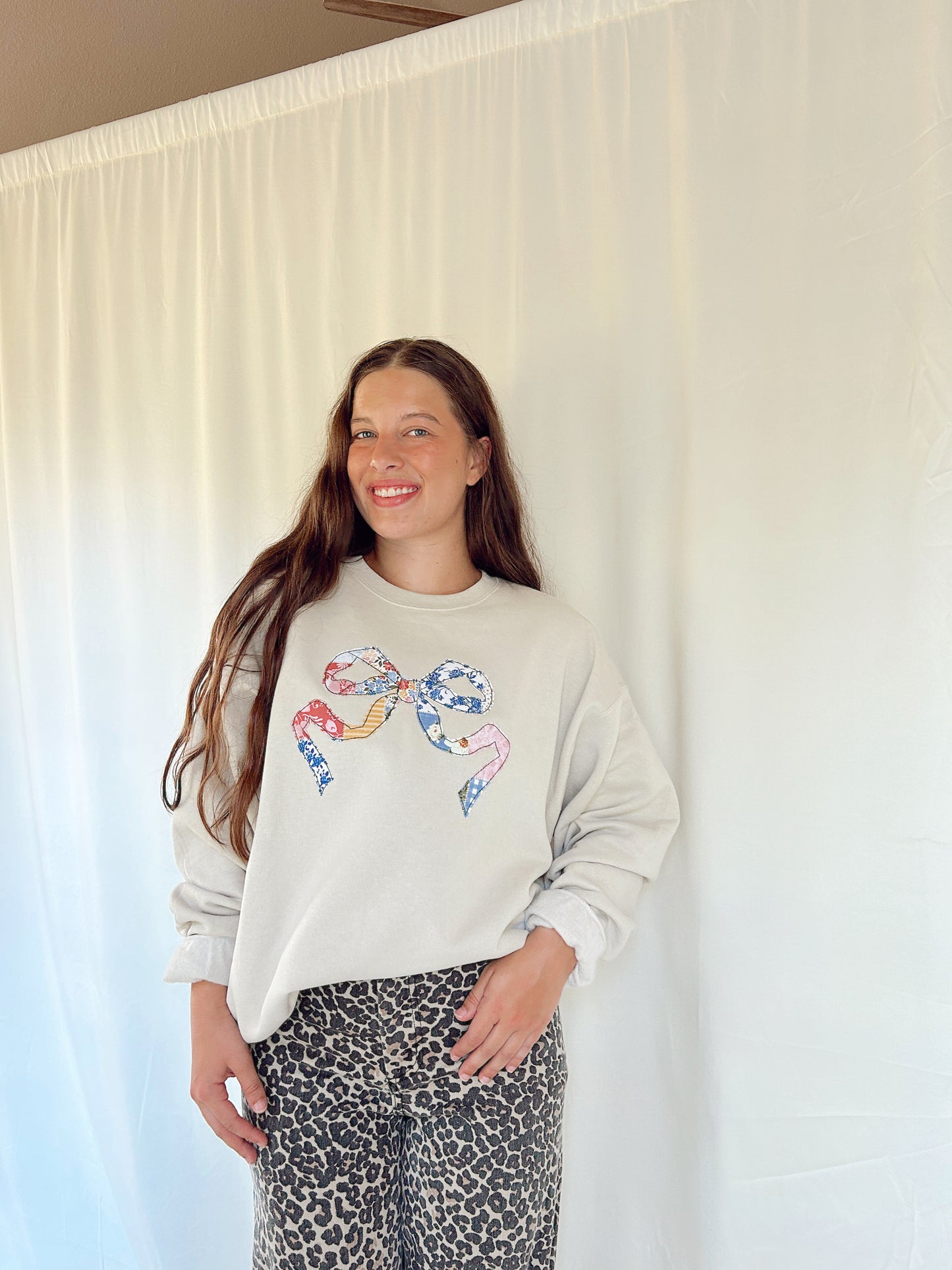 GIRLY BOW SWEATSHIRT