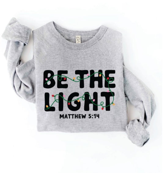BE THE LIGHT CHRISTMAS SWEATSHIRT