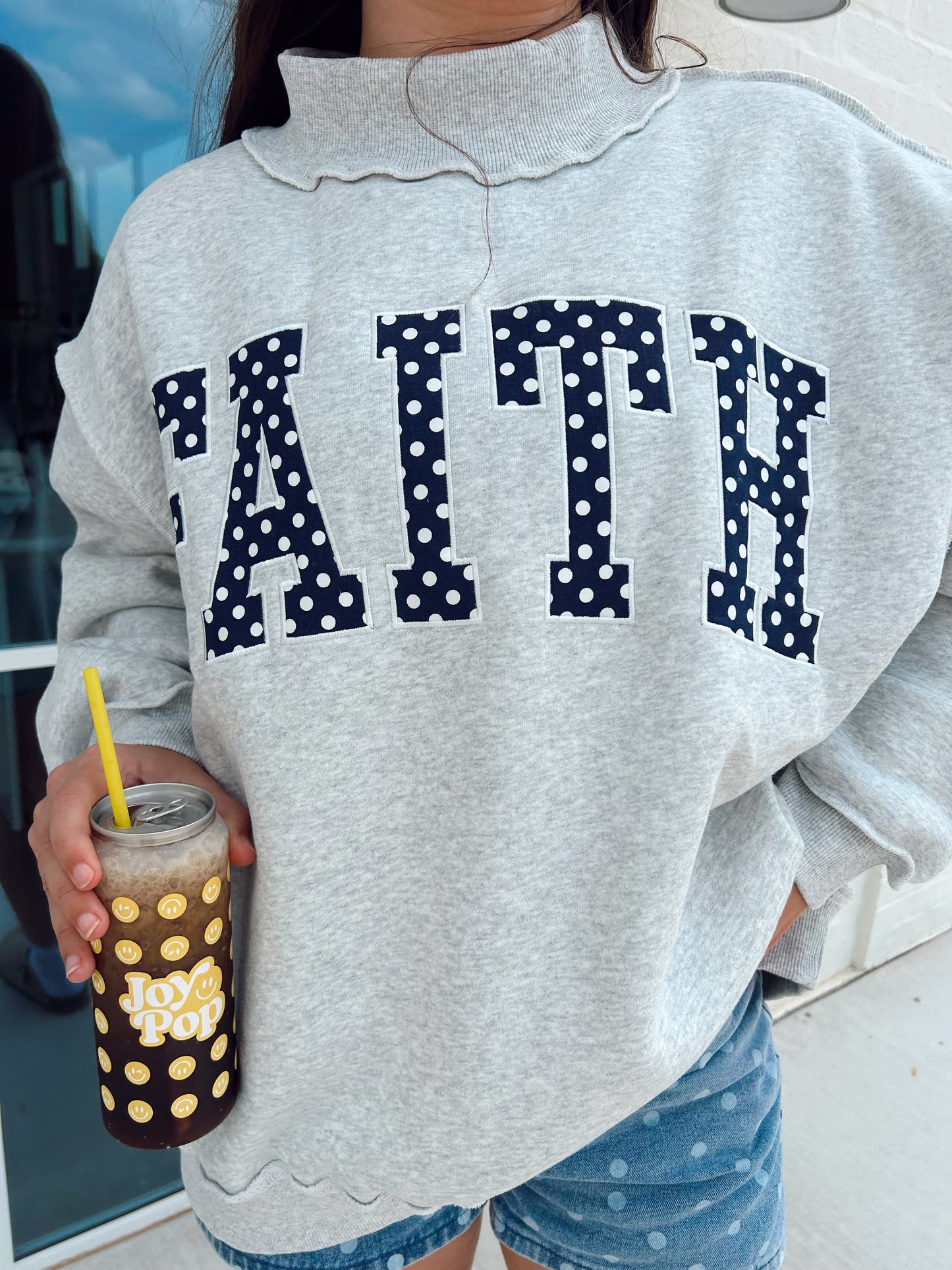 FAITH MOCKNECK DOT SWEATSHIRT