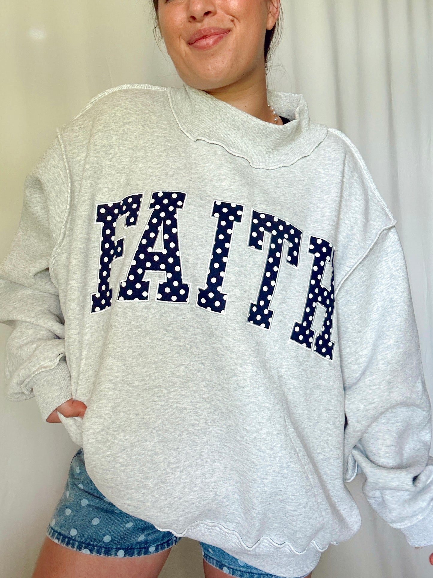 FAITH MOCKNECK DOT SWEATSHIRT